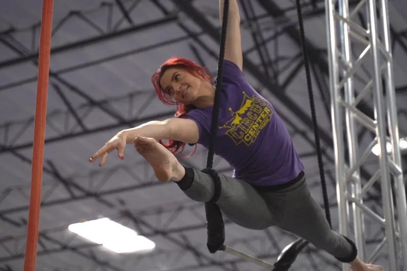 An adult athlete practicing on static trapeze at LVCC